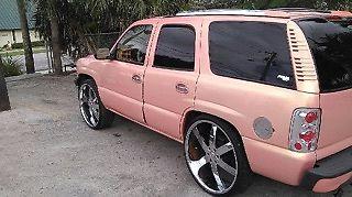 2005 Candy Paint Chevrolet Tahoe with Custom Interior and 28″ rims