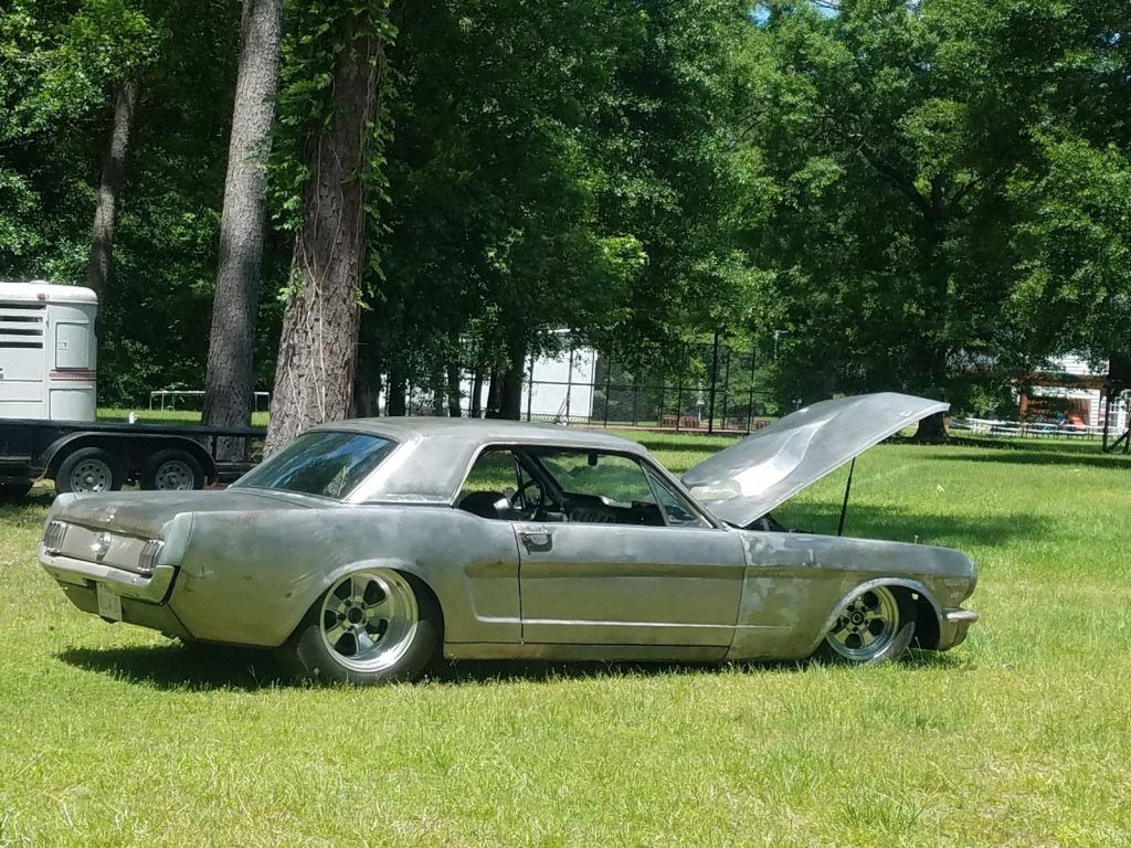 bare metal 1965 Ford Mustang Coupe custom